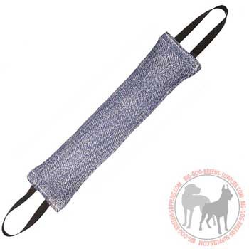 Dog bite tug with 2 handles on its ends